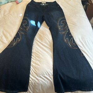 SHYANNE Flair Jeans w/ cream and beige stitch design! 
Worn twice before.